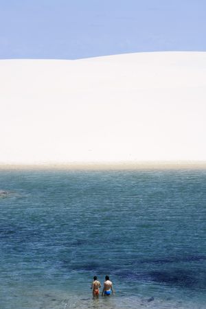 view of lagoa azul in desert sand dunes of the Lencois Maranheses National Park in brazilの写真素材
