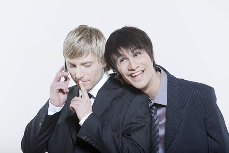 two male expressive young men on isolated backgroundの写真素材