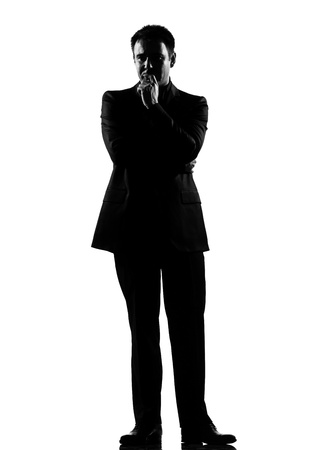 silhouette caucasian business man   thinking pensive expressing behavior full length on studio isolated white backgroundの写真素材