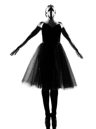 beautiful caucasian tall woman ballet dancer standing tiptoe pose  full length on studio isolated white backgroundの写真素材