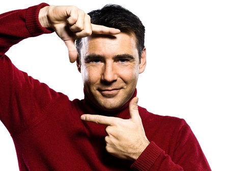 caucasian man finger frame gesture studio portrait on isolated white backgound