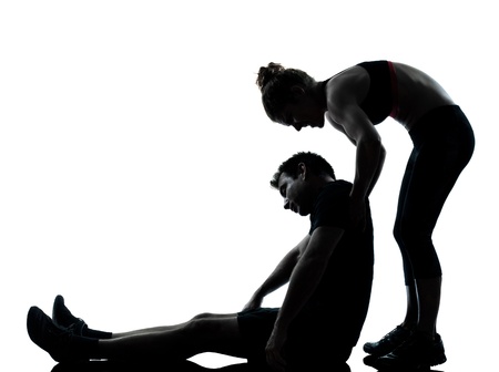 one couple man woman exercising workout aerobic fitness posture full length silouhette on studio isolated on white backgroundの写真素材