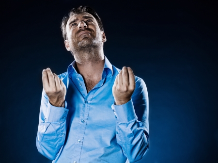 caucasian man unshaven asking distraught portrait isolated studio on black backgroundの写真素材