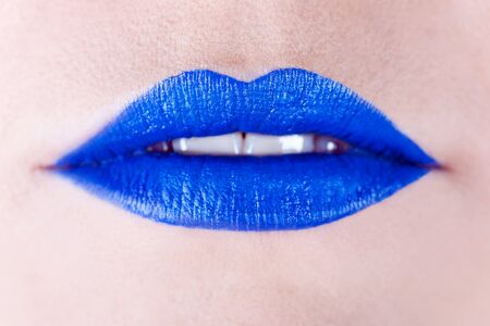 Background of a woman's blue lipsの写真素材