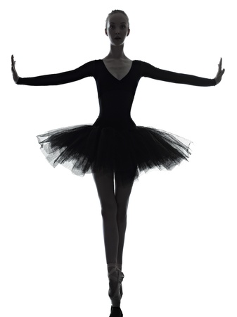 one caucasian young woman ballerina ballet dancer dancing with tutu in silhouette studio on white backgroundの写真素材