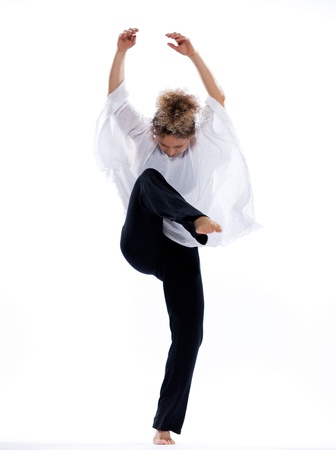 beautiful mature woman dancing modern ballet on isolated white backgroundの写真素材