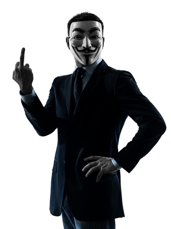 PARISâ OCTOBER 30 : one man dressed and masked as a  member of Anonymous underground group pointing finger on October 30, 2012 in Paris ,Franceのeditorial素材