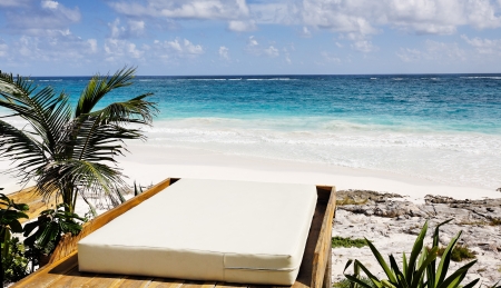 terrace of a cabana with a view of the beautiful white sand beach of tulum in yucatan mexicoの写真素材