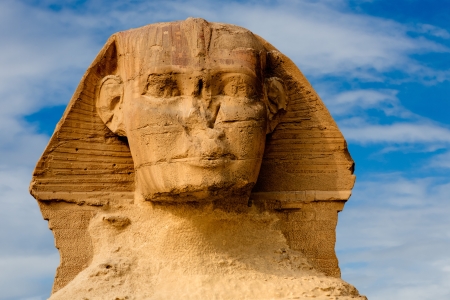 view of the sphynx with the pyramids of gizah near cairo in egyptの写真素材