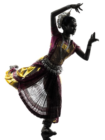 one indian woman dancer dancing in silhouette studio isolated on white backgroundの写真素材