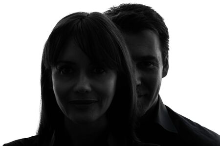 one caucasian couple woman man close up portrait  in silhouette studio isolated on white backgroundの写真素材