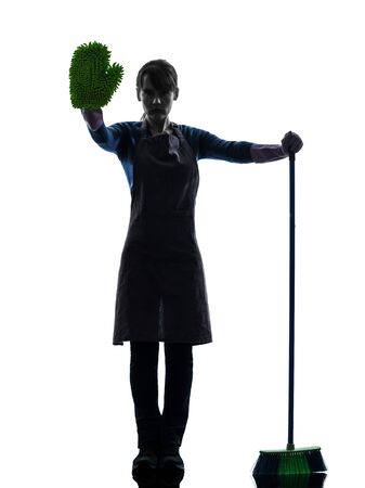 one caucasian woman maid cleaning brooming  stop gesture in silhouette studio isolated on white backgroundの写真素材