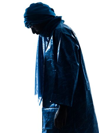 one Tuareg Portrait in silhouette studio isolated on white backgroundの写真素材