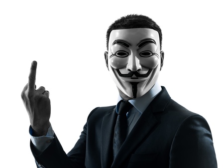 PARIS,OCTOBER 30   one man dressed and masked as a  member of Anonymous underground group pointing finger on October 30, 2012 in Paris ,Franceのeditorial素材