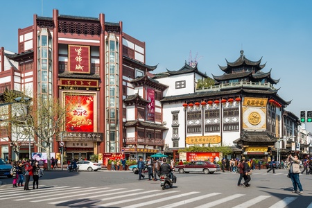 Shanghai, China - April 7, 2013: people walking at the main street of  Fang Bang Zhong Lu  at old...