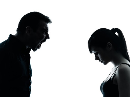 one man and teenager girl dispute conflict  in silhouette indoors isolated on white backgroundの写真素材