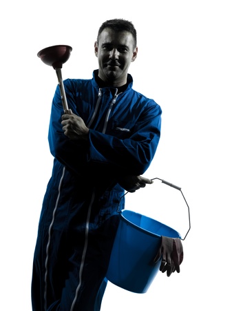 one caucasian janitor cleaner cleaning silhouette in studio on white backgroundの写真素材