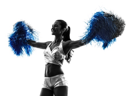 one young woman cheerleader cheerleading  silhouette studio on white backgroundの写真素材
