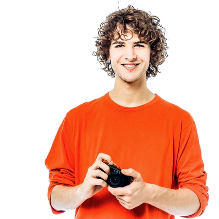 one young man caucasian holding camera portrait  in studio white background