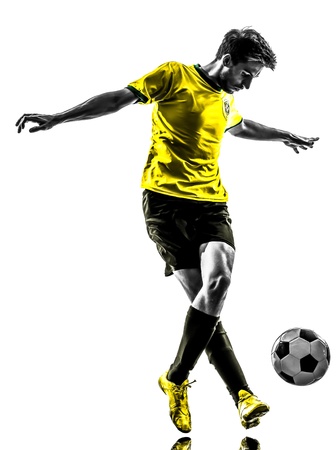 one brazilian soccer football player young man in silhouette studio  on white background