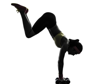 one  woman exercising fitness workout in silhouette  on white background