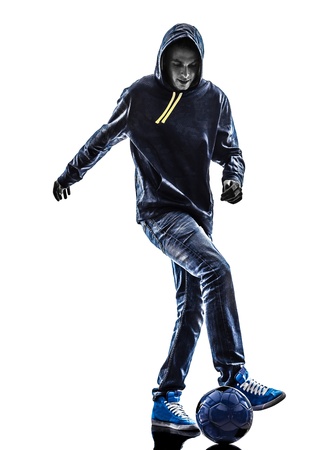 one caucasian young man soccer freestyler player in silhouette on white background one caucasian young man soccer freestyler player in silhouette on white background