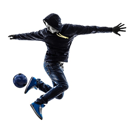 one caucasian young man soccer freestyler player in silhouette on white background one caucasian young man soccer freestyler player in silhouette on white background