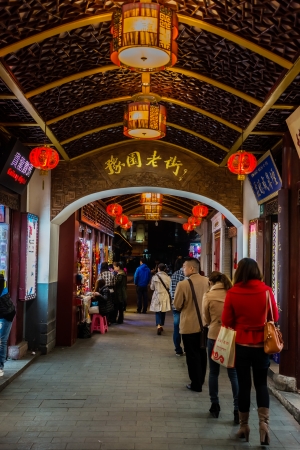 Shanghai, China - April 7, 2013: tourist walking Fang Bang Zhong Lu old city at night in the city of Shanghai in China on april 7th, 2013のeditorial素材