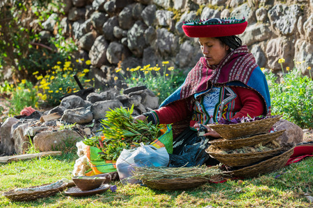 Cuzco, Peru - July 15, 2013: woman with natural dyes in the peruvian Andes at Cuzco Peru on july 15th 2013のeditorial素材