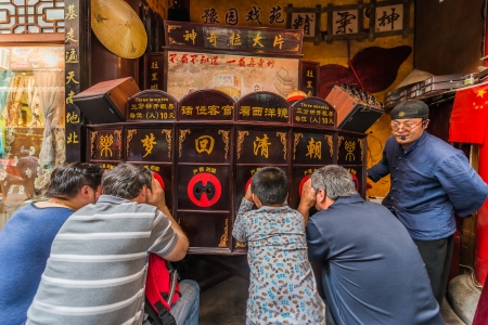 Shanghai, China - April 7, 2013: people watching Chinese cinema at the city of Shanghai in China on april 7th, 2013のeditorial素材