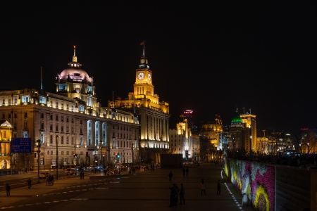 Shanghai, China - April 7, 2013: custom house and hsbc building  the bund at night at the city of Shanghai in China on april 7th, 2013のeditorial素材