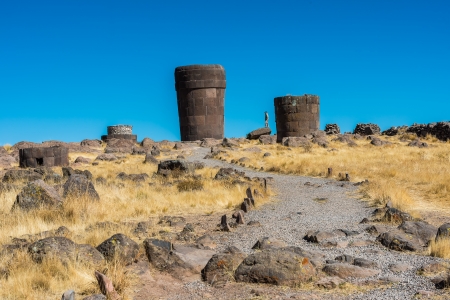 Tourist at the Silustani tombs in the peruvian Andes at Puno Peruの写真素材