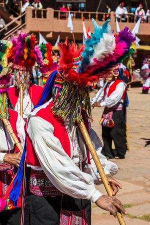 Puno, Peru - July 25, 2013: musicians and dancers in the peruvian Andes at Taquile Island on Puno Peru at july 25th, 2013.のeditorial素材