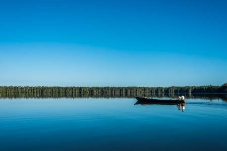 people on boat in the peruvian Amazon jungle at Madre de Dios Peruのeditorial素材