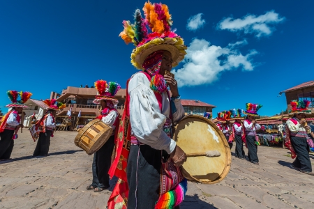 Puno, Peru - July 25, 2013: musicians and dancers in the peruvian Andes at Taquile Island on Puno Peru at july 25th, 2013.のeditorial素材