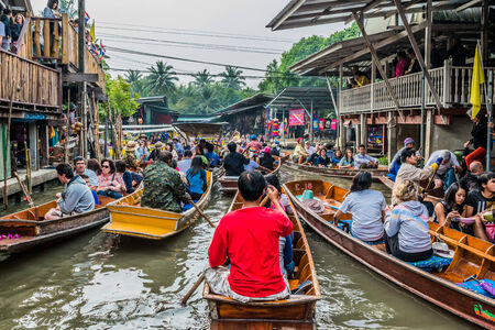 Bangkok, Thailand - December 30, 2013: people on boats at Amphawa Bangkok floating market at Bangkok, Thailand on december 30th, 2013のeditorial素材
