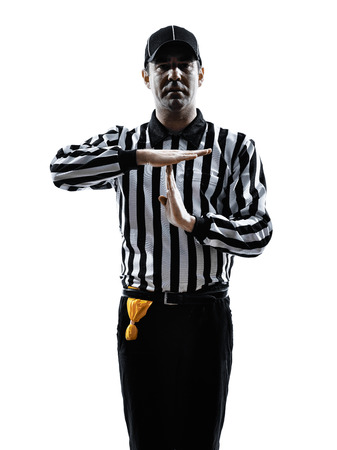 american football referee gestures time out in silhouette on white backgroundの写真素材
