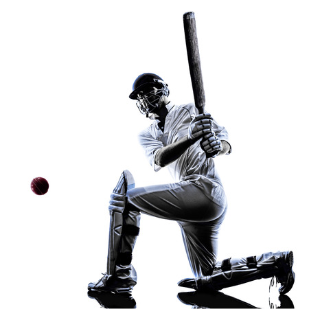 Cricket player batsman in silhouette shadow on white backgroundの写真素材