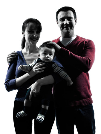 portrait parents with baby in silhouettes on white backgroundの写真素材