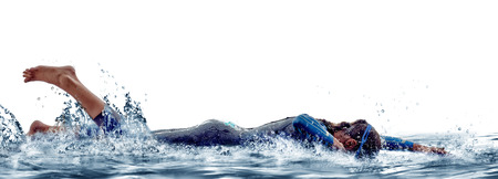woman triathlon ironman athlete  swimmers on white backgroundの写真素材