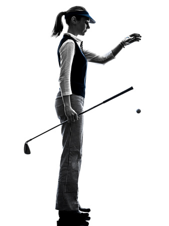 woman golfer golfing silhouette in white backgroundの写真素材