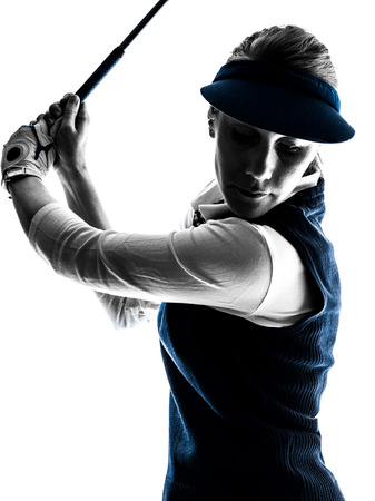 woman golfer golfing silhouette in white backgroundの写真素材