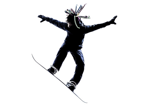 one  young snowboarder man in silhouette white backgroundの写真素材