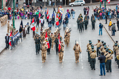 Cuzco, Peru - July 14, 2013: Peruvian  soldiers parading in the Plaza de Armas at Cuzco Peruのeditorial素材