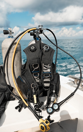 scuba diving equipment on a boat on a seaのeditorial素材