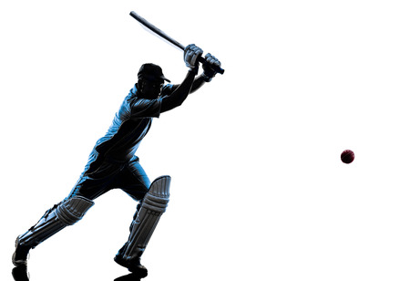 Cricket player batsman in silhouette shadow on white backgroundの写真素材