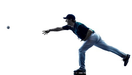 one caucasian man baseball player playing  in studio  silhouette isolated on white backgroundの写真素材