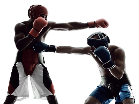 two men boxers boxing on isolated silhouette white backgroundの写真素材