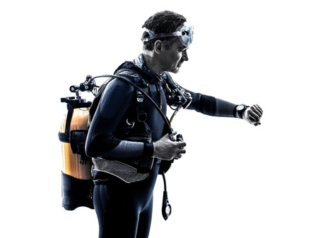 one caucasian scuba diver diving man  in studio  silhouette isolated on white backgroundの写真素材