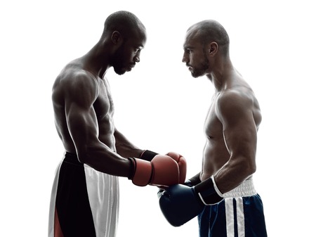 two men boxers boxing on isolated silhouette white backgroundの写真素材